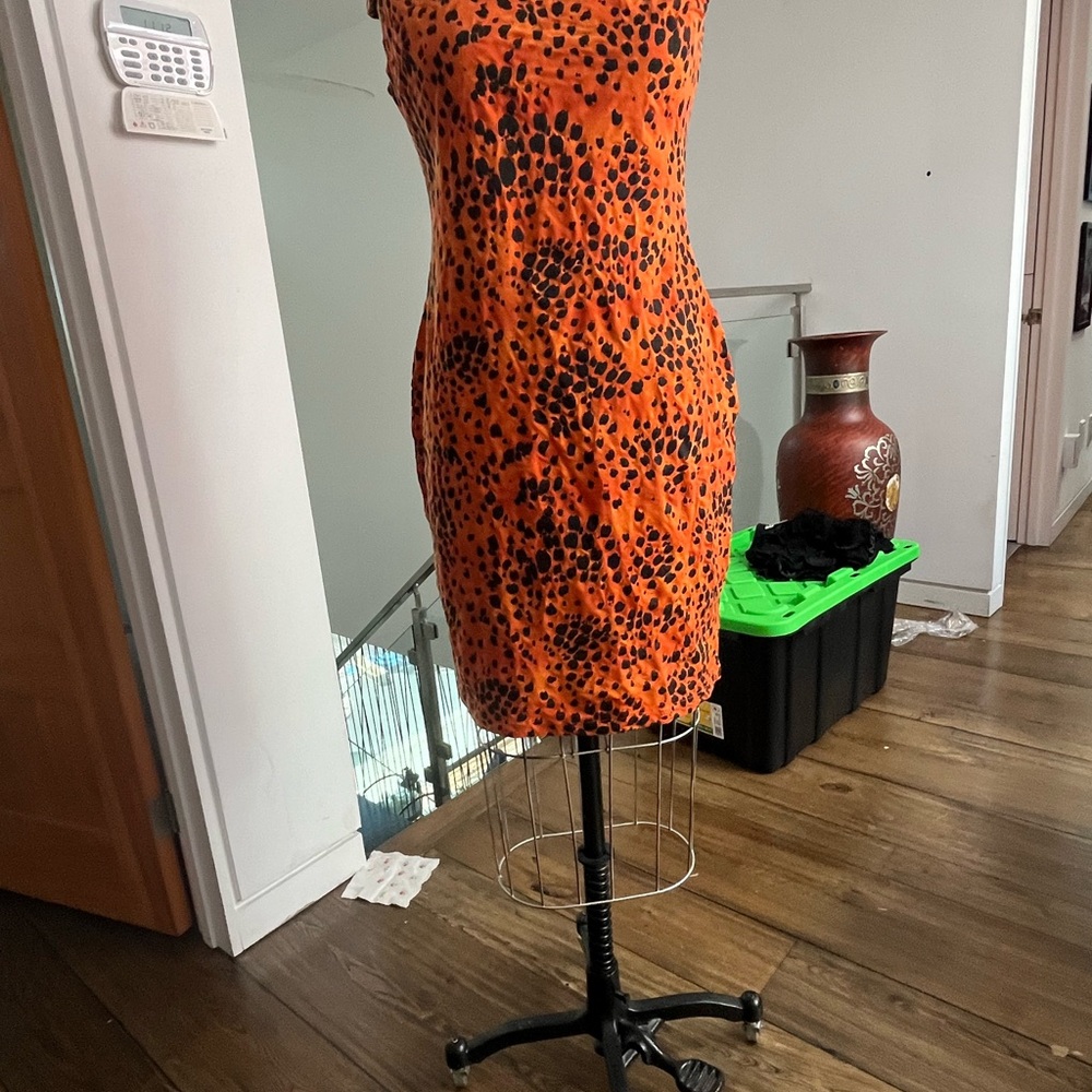 orange & black stretch off shoulder dress size medium
